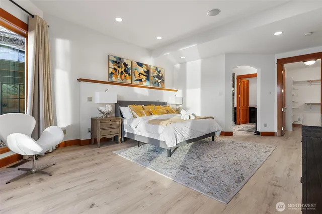 a bedroom with a bed and furniture