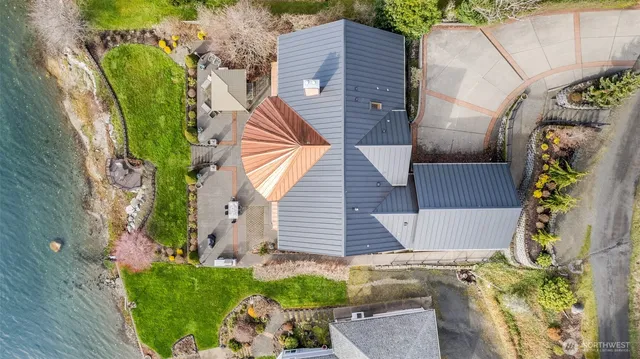 a view of a house with a small yard