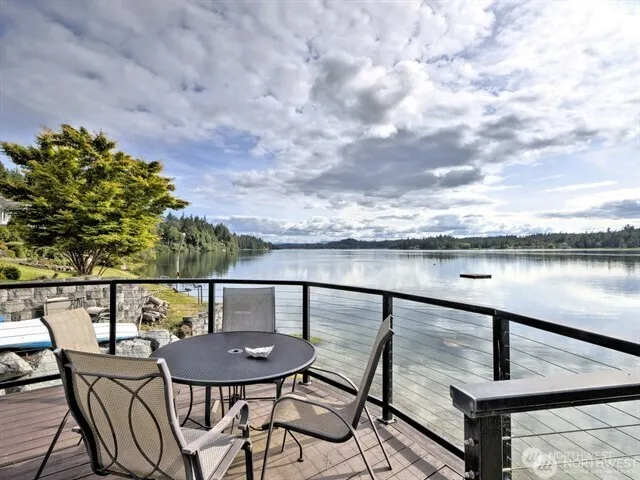 a view of a balcony with furniture