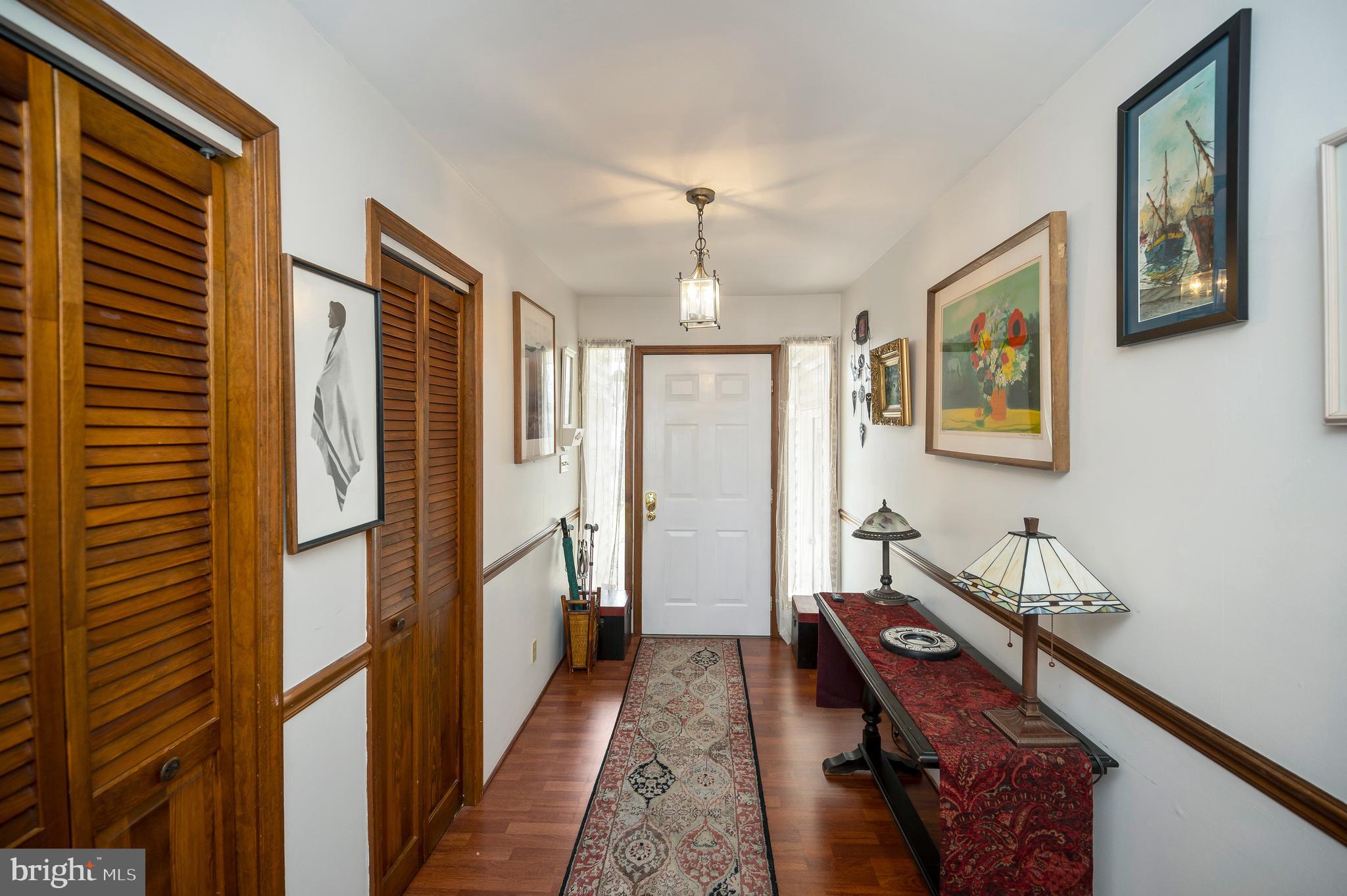 view from living room to entry foyer