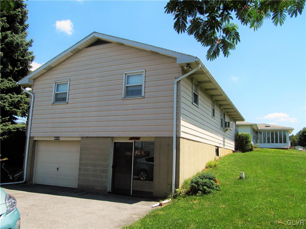 Left side is a tandem 2 car garage. Right side is