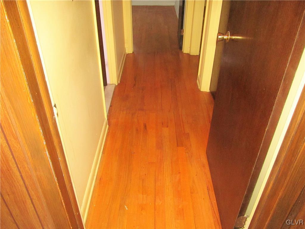 3502 Nazareth Road Easton, PA 18045 - Photo 8 of 18 Hardwood floors in hallway are in decent shape.