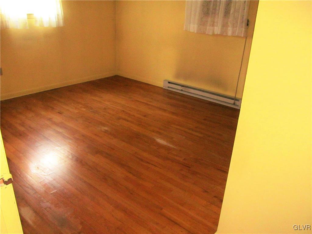 3502 Nazareth Road Easton, PA 18045 - Photo 9 of 18 Hardwood in master bedroom need a little work. Som