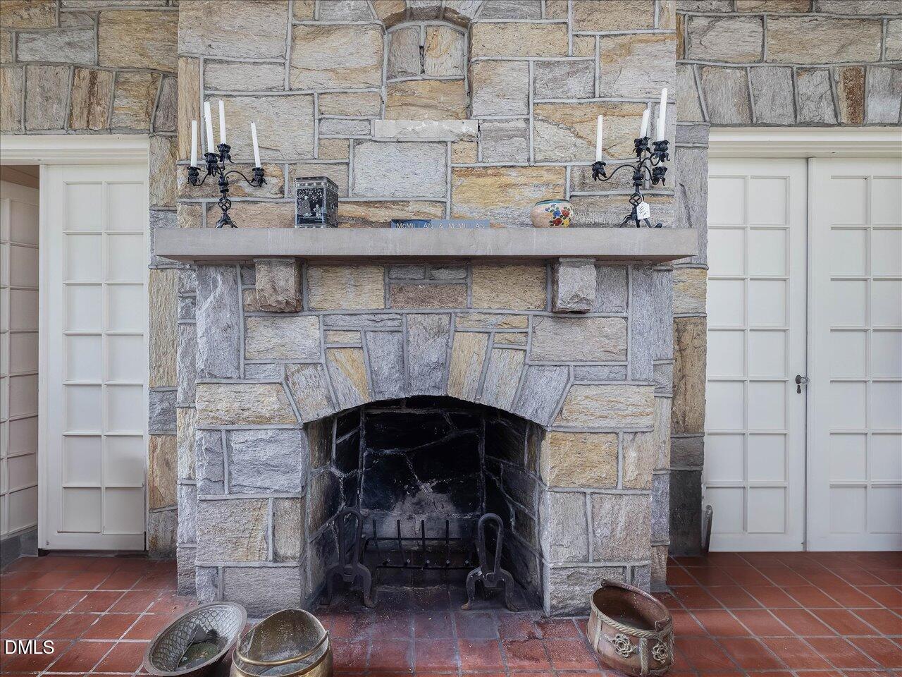 216-204 Hawthorne Road Raleigh, NC 27605 - Photo 13 of 28 a room with a fireplace and wooden floor