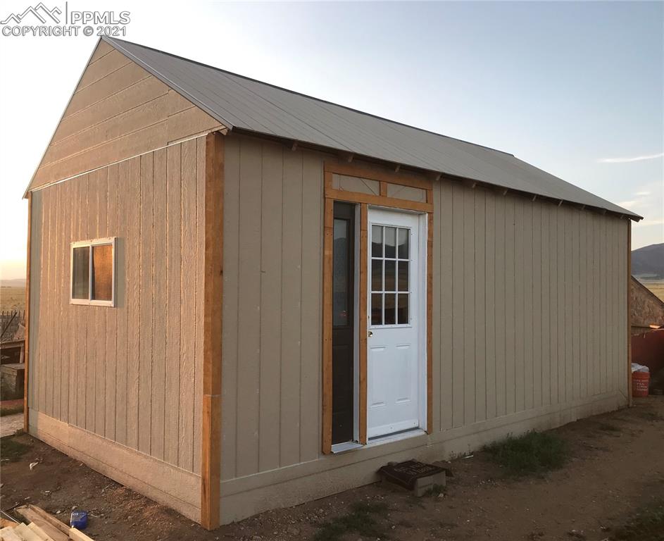 1083 Chase Gulch Road Hartsel, CO 80449 - Photo 1 of 14 a backyard of a house