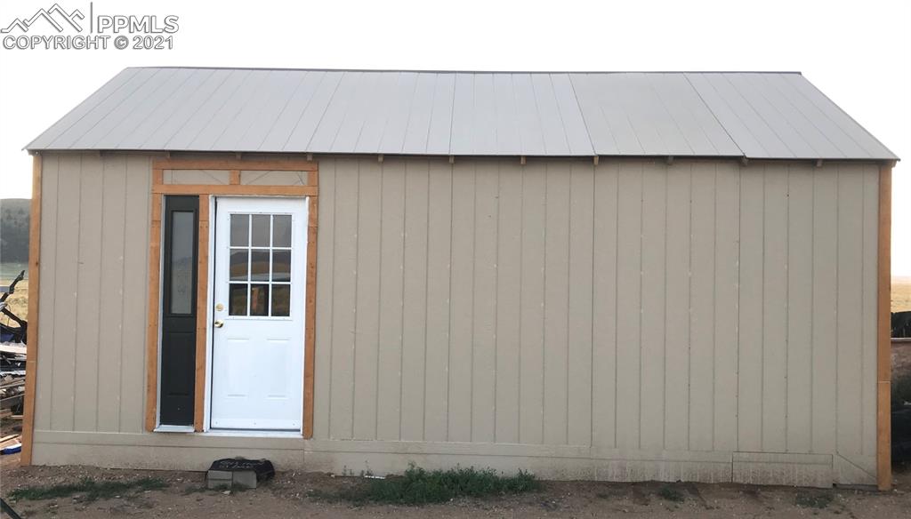 1083 Chase Gulch Road Hartsel, CO 80449 - Photo 2 of 14 a view of a house with a car garage