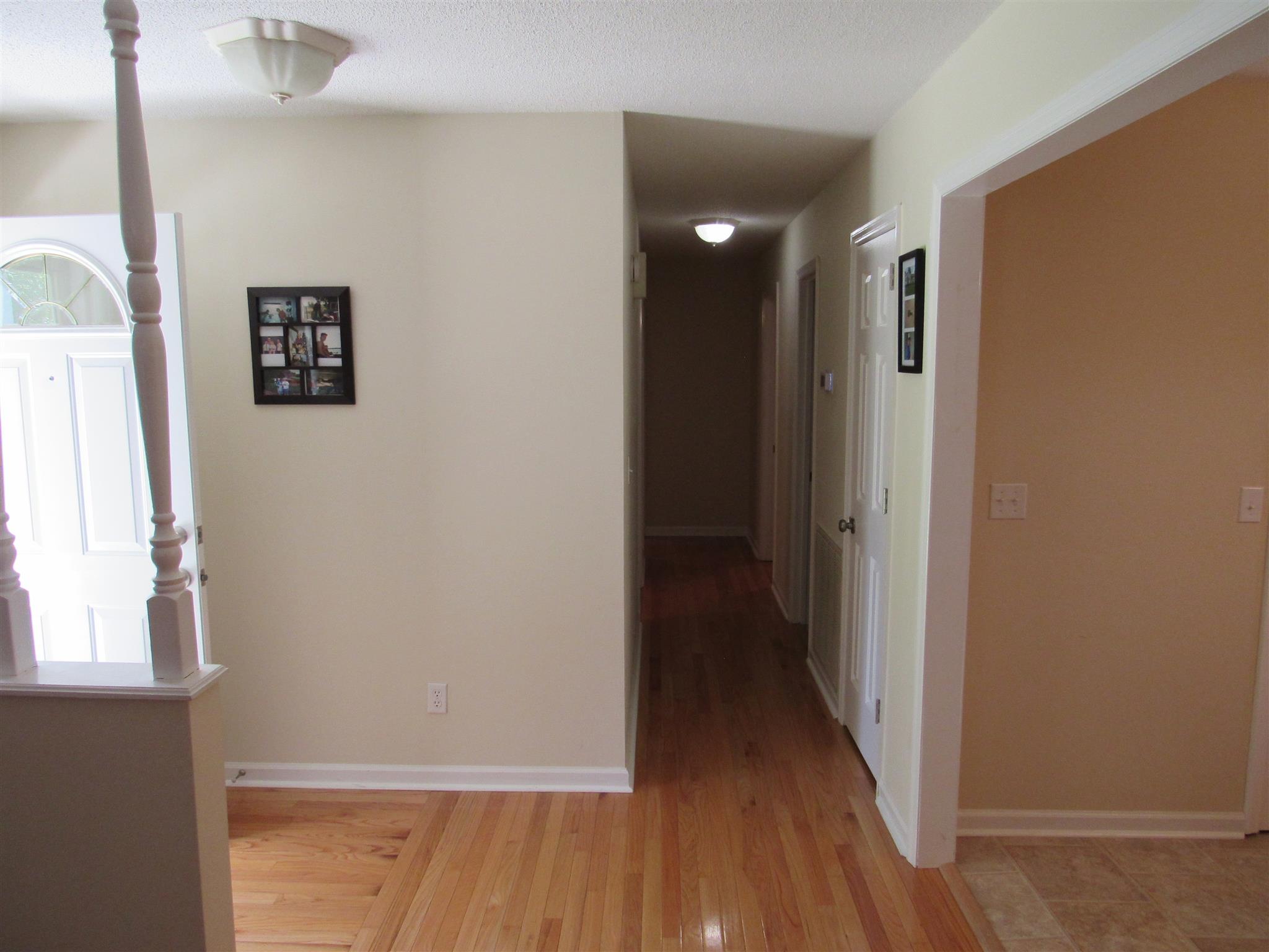 1070 Riley Creek Road Tullahoma, TN 37388 - Photo 11 of 17 a view of a hallway with wooden floor and a window