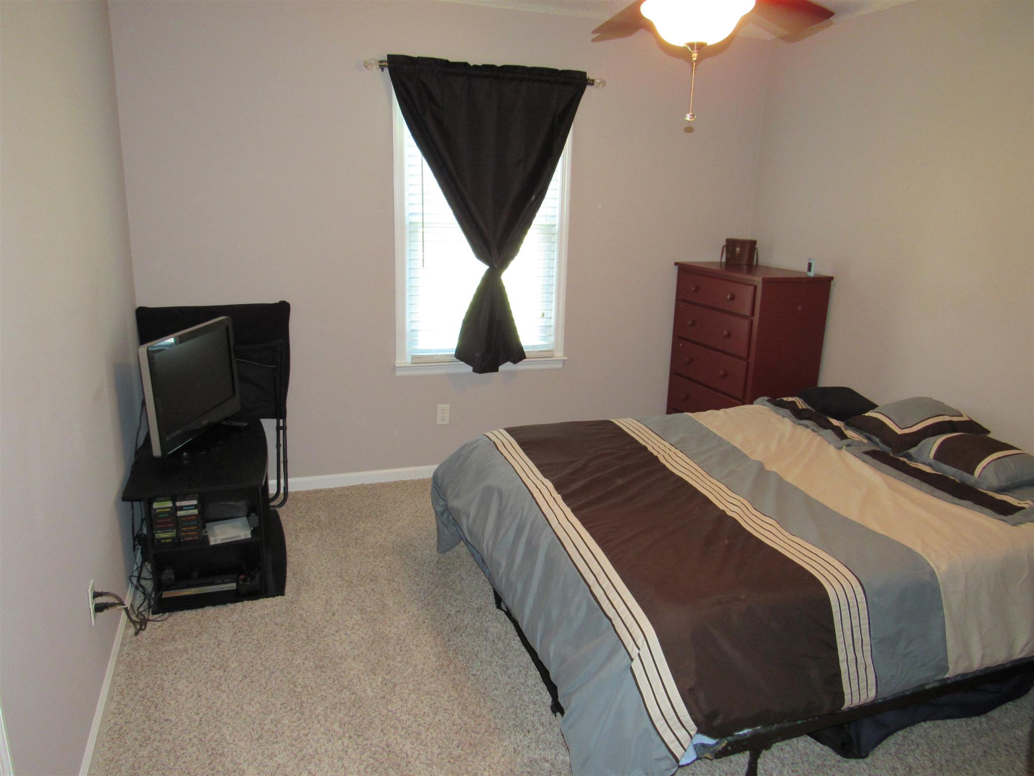 1070 Riley Creek Road Tullahoma, TN 37388 - Photo 14 of 17 a bedroom with a bed and window