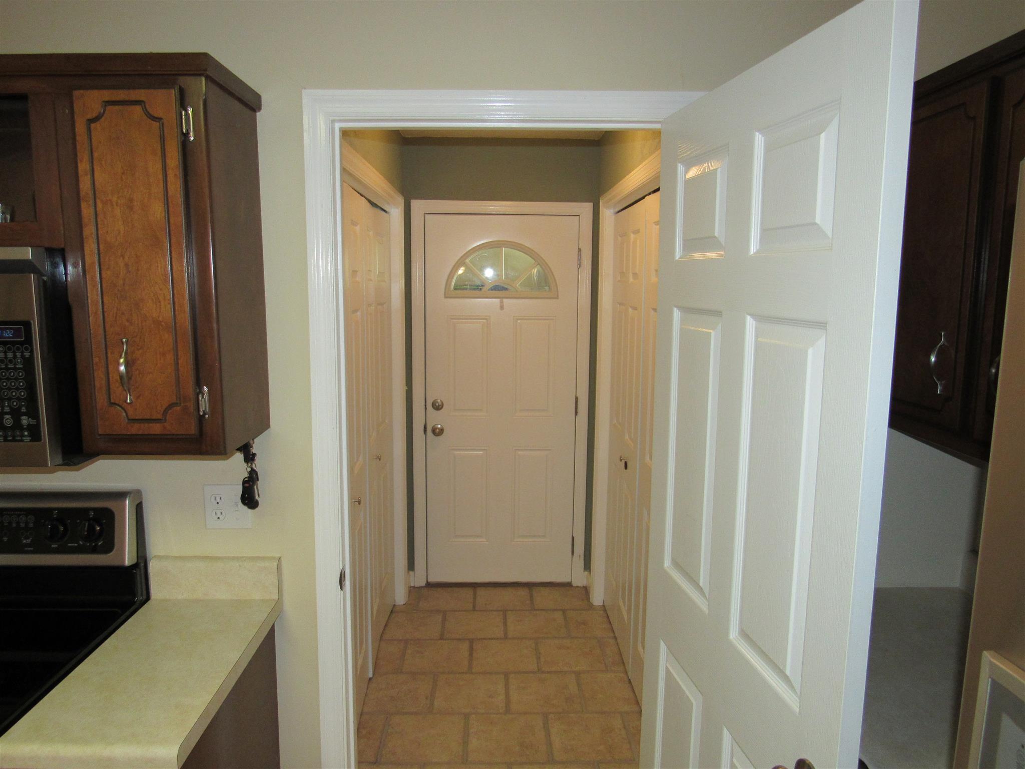 1070 Riley Creek Road Tullahoma, TN 37388 - Photo 5 of 17 a bathroom with a sink a mirror and a shower