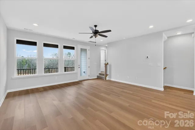 an empty room with windows