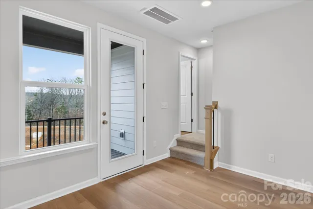 a bathroom with a sink toilet and a mirror