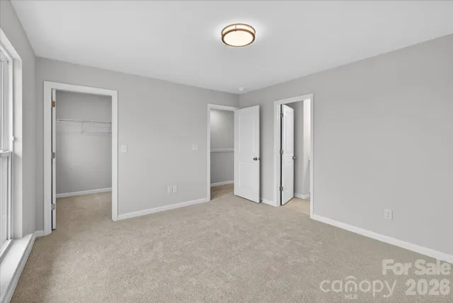 a view of an empty walk in closet