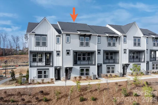 a view of balcony with wooden floor