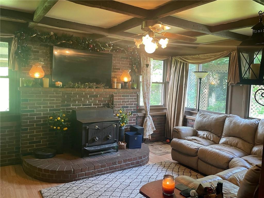 600 Wises Grove Road New Brighton, PA 15066 - Photo 6 of 13 a living room with furniture and a chandelier