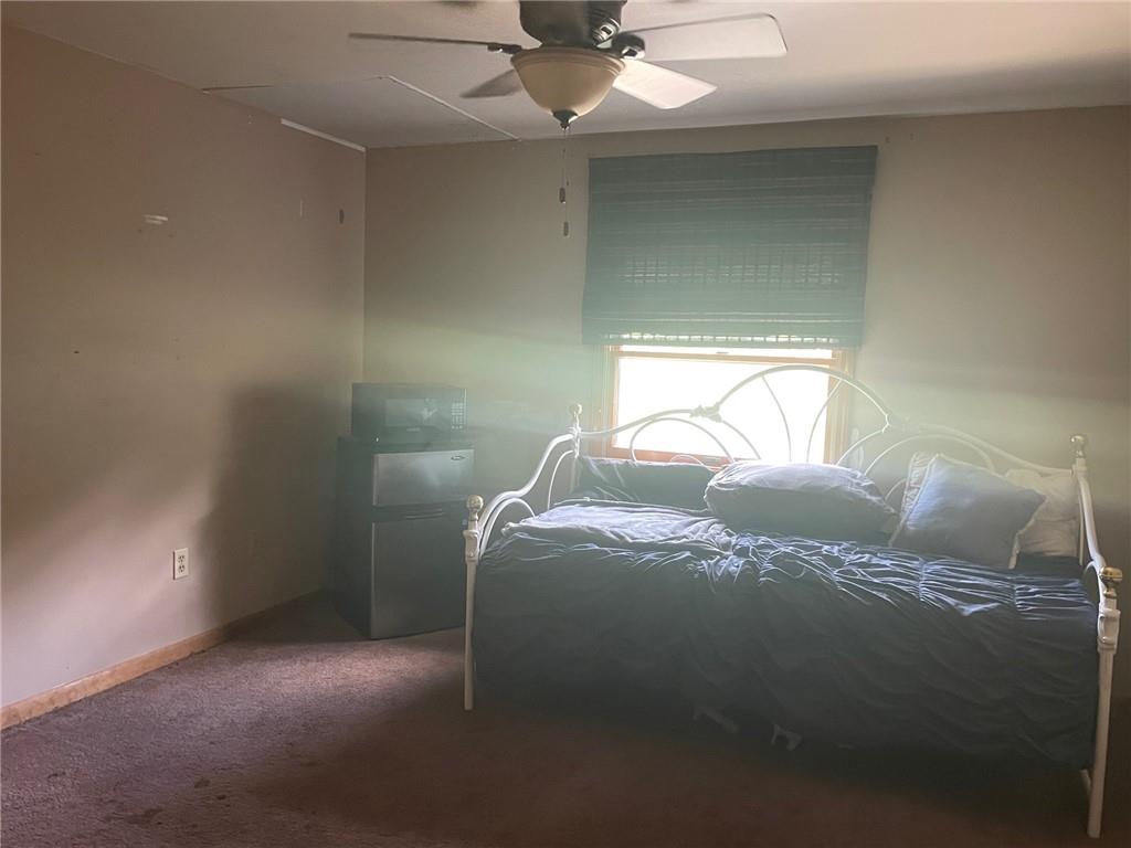 600 Wises Grove Road New Brighton, PA 15066 - Photo 10 of 13 a bed sitting in a bedroom next to a window