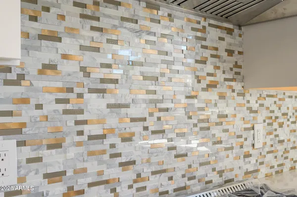 a bathroom with a shower and a shower