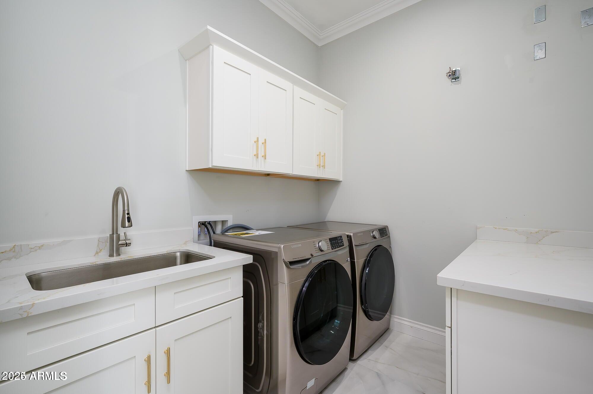 6729 North 13th Street Phoenix, AZ 85014 - Photo 22 of 24 a utility room with sink dryer and washer