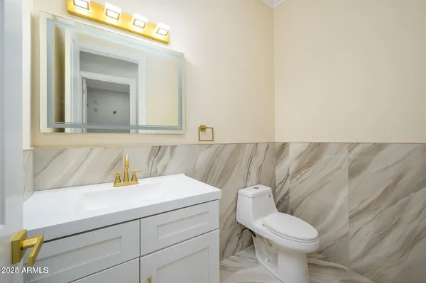 a bathroom with a sink and a toilet