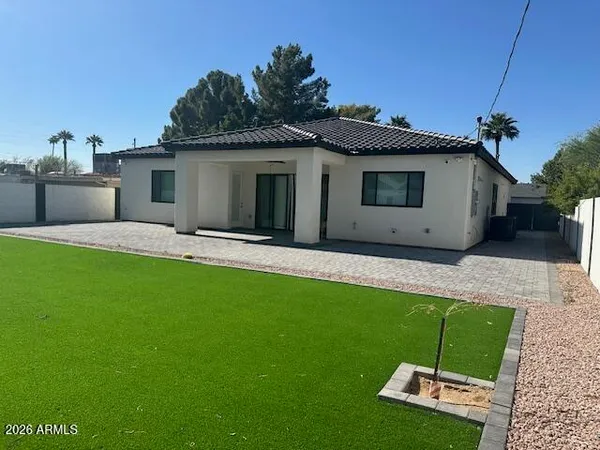 a house view with a garden space