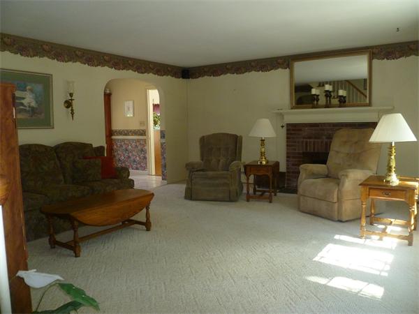 20 Siani Road Leicester, MA 01542 - Photo 12 of 23 a living room with furniture and a fireplace