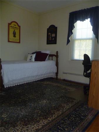 20 Siani Road Leicester, MA 01542 - Photo 18 of 23 a bedroom with a bed and a window