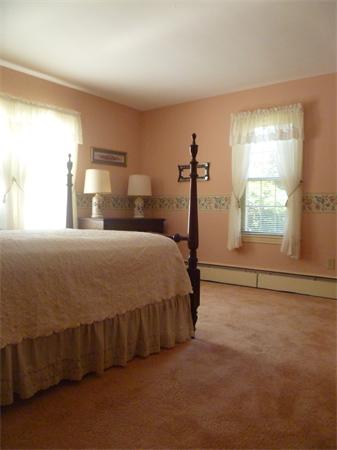 20 Siani Road Leicester, MA 01542 - Photo 19 of 23 a bedroom with a bed and a window