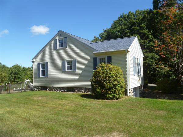 20 Siani Road Leicester, MA 01542 - Photo 23 of 23 a front view of a house with a garden