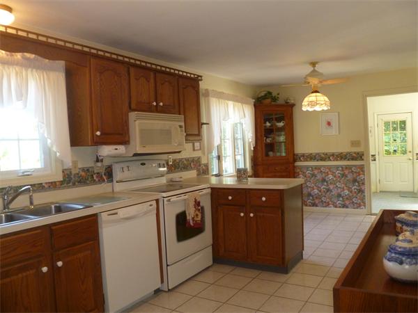 20 Siani Road Leicester, MA 01542 - Photo 8 of 23 a kitchen with a sink and cabinets