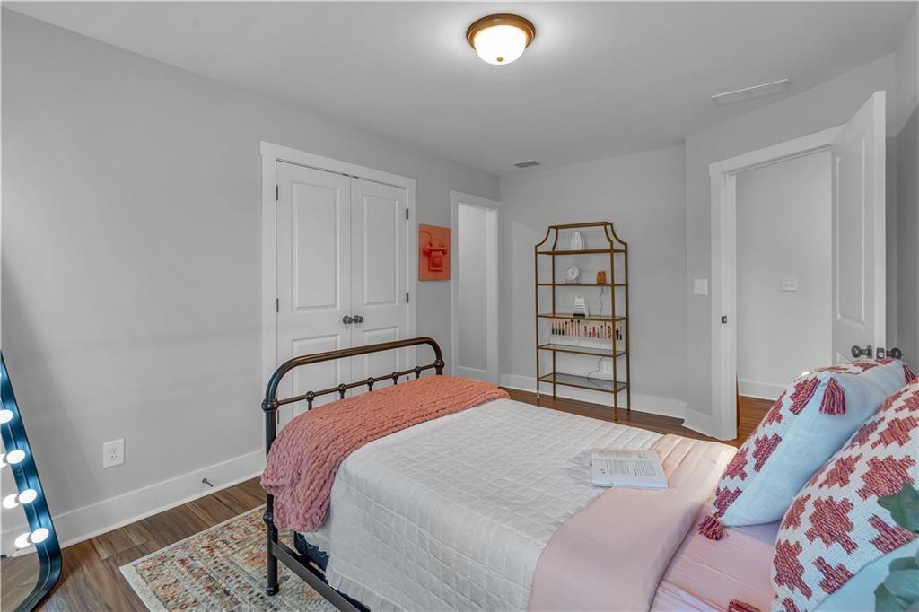 44 Puckett Road Emerson, GA 30137 - Photo 23 of 38 a bedroom with a bed and a window