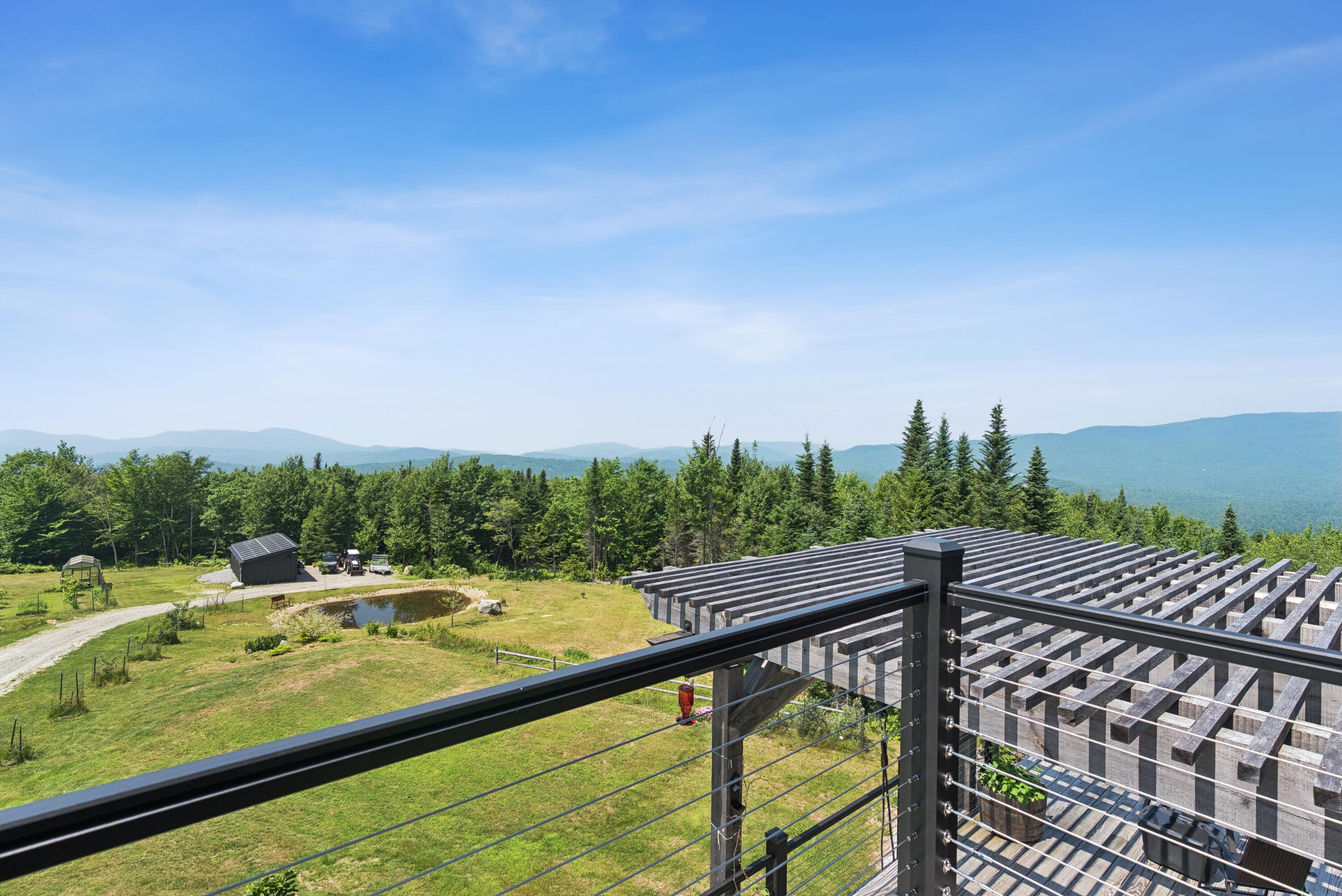 341 Outlook Road Bryant Pond, ME 04219 - Photo 39 of 112 View from Loft Deck to Western Mts