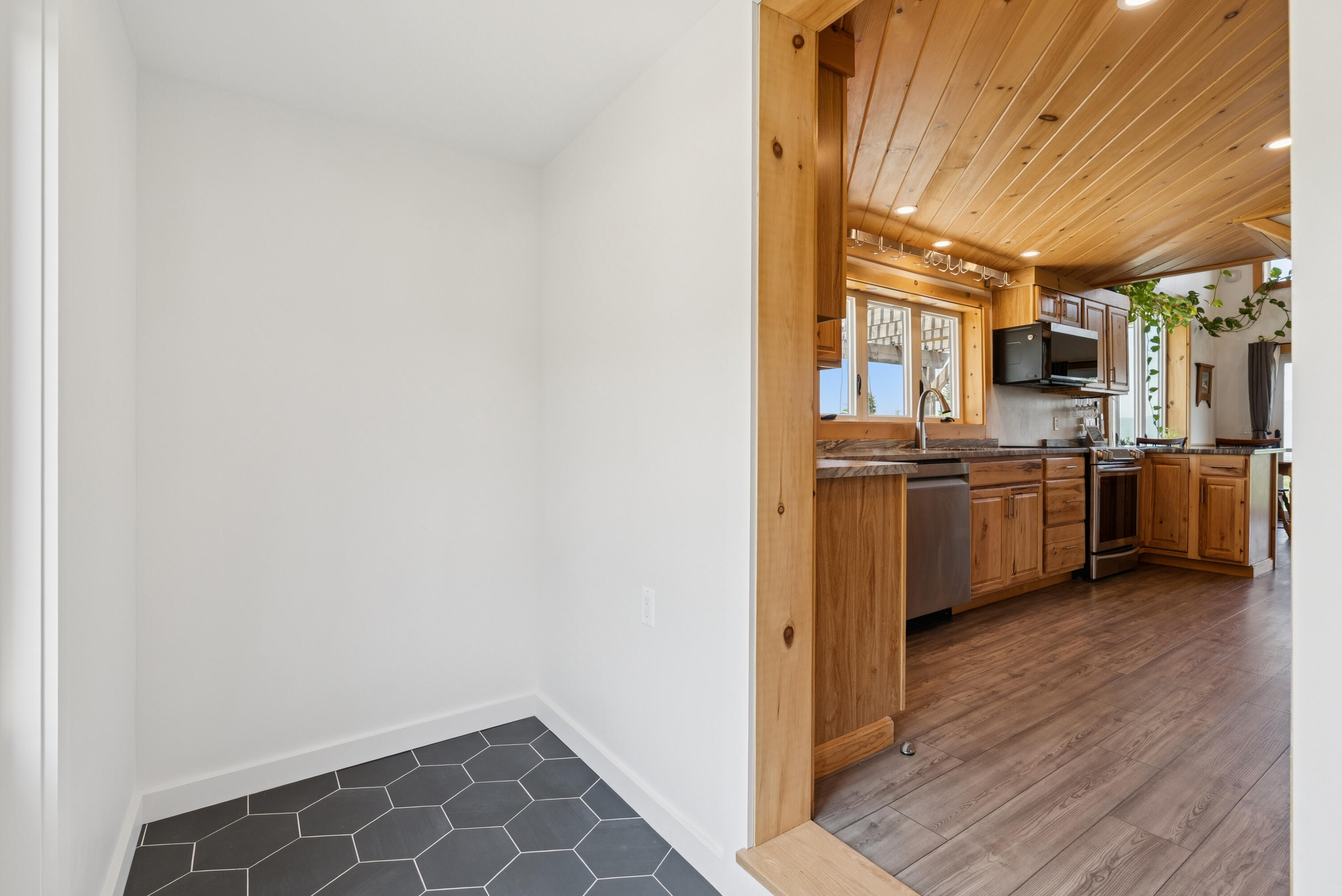 341 Outlook Road Bryant Pond, ME 04219 - Photo 49 of 112 Bright entryway