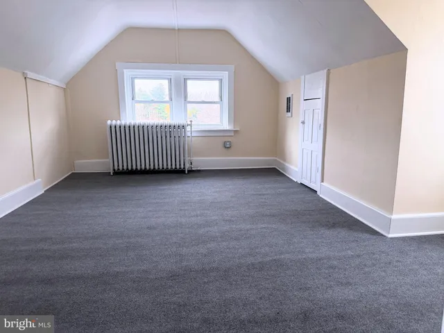 a view of a livingroom with a staircase