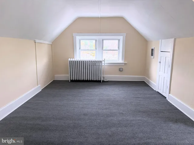 a view of a livingroom with a staircase
