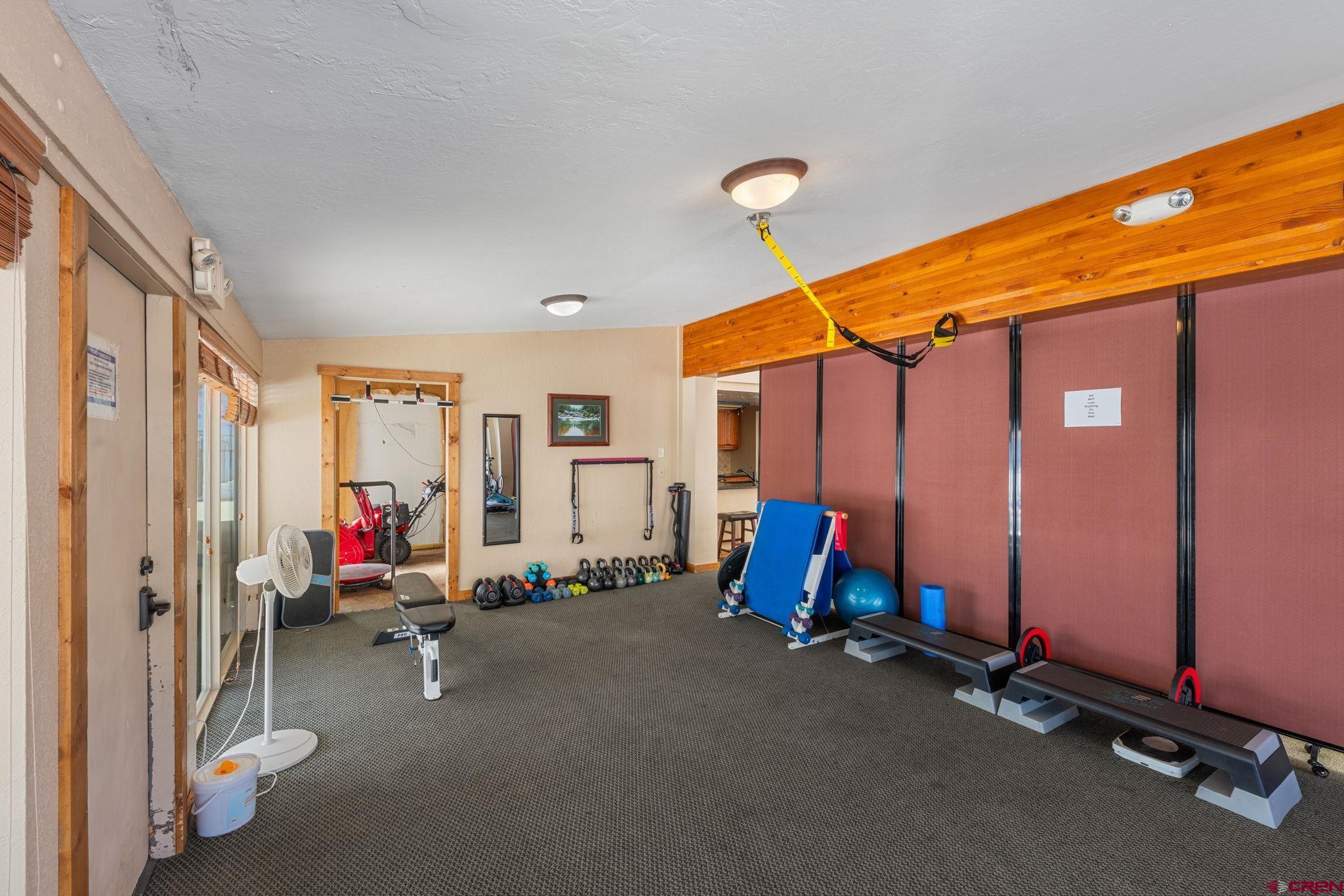 651 Gothic Road, Unit 505 Crested Butte, CO 81225 - Photo 34 of 44 a view of a room with gym equipment