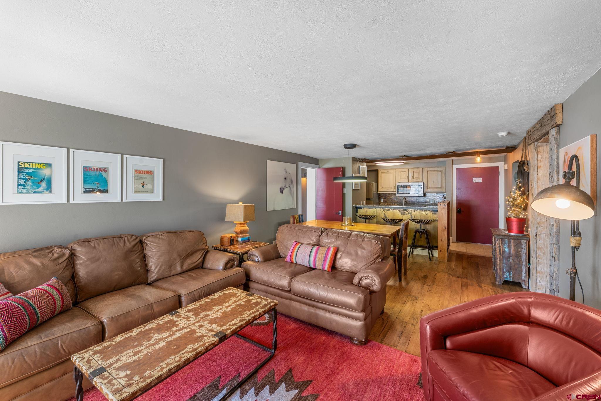 651 Gothic Road, Unit 505 Crested Butte, CO 81225 - Photo 6 of 44 a living room with furniture and a couch