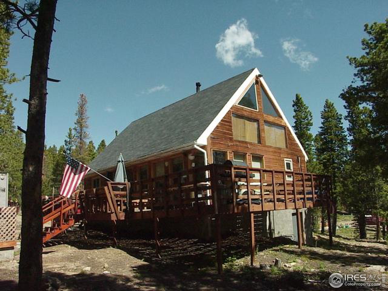 104 Claudius Road Black Hawk, CO 80422 - Photo 1 of 6 a front view of a house with a yard