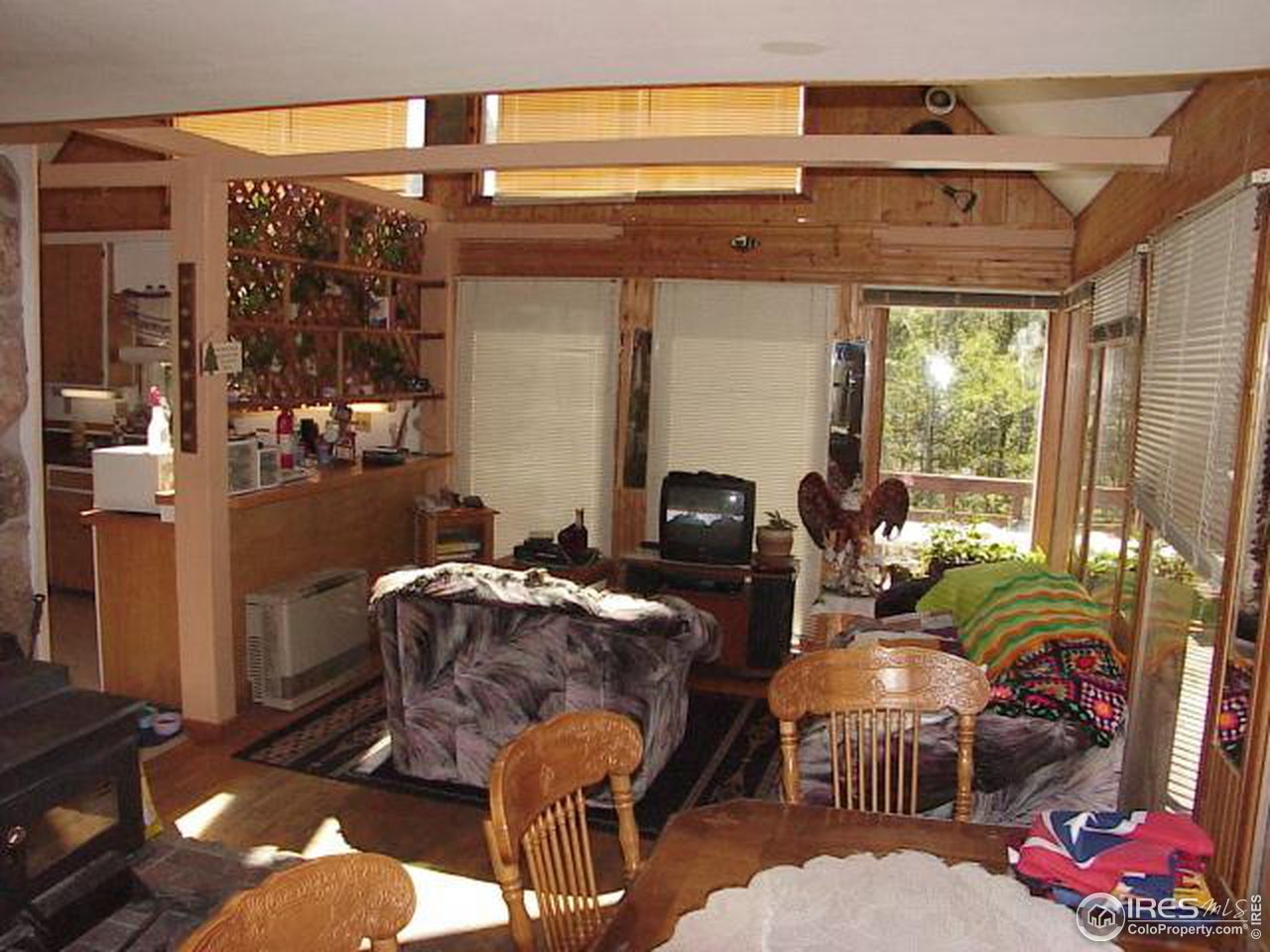 104 Claudius Road Black Hawk, CO 80422 - Photo 2 of 6 a living room filled with furniture