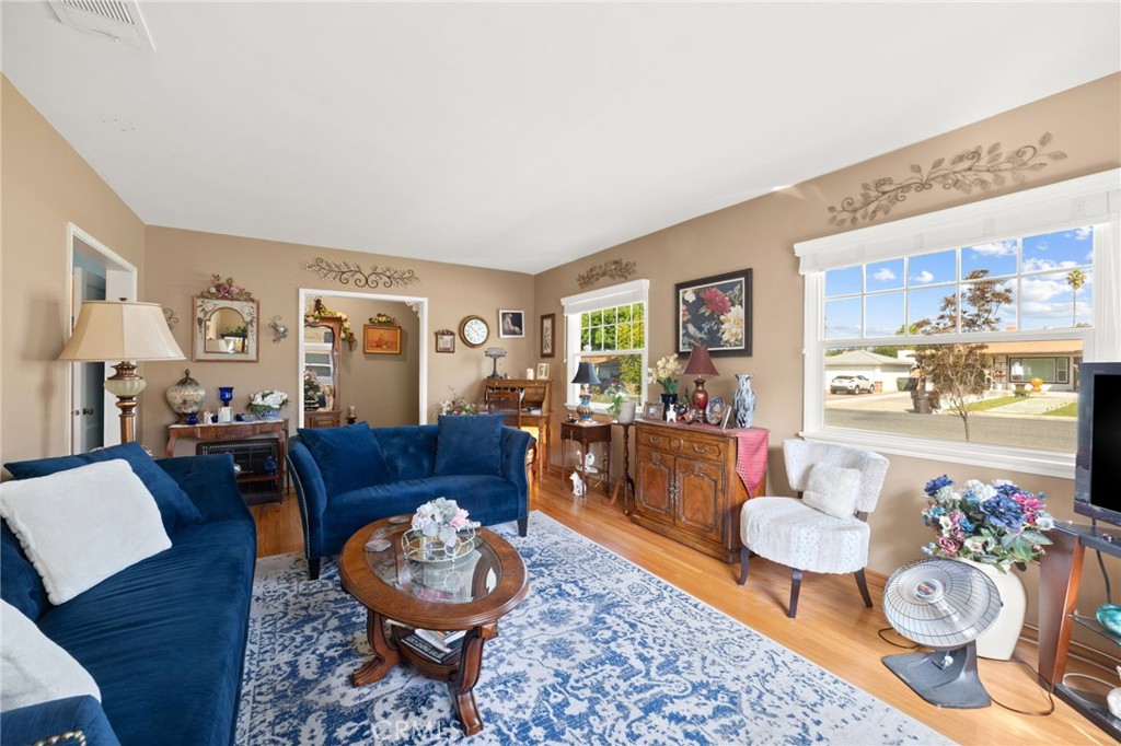 3924 Wayne Court Riverside, CA 92504 - Photo 12 of 31 a living room with furniture and a table
