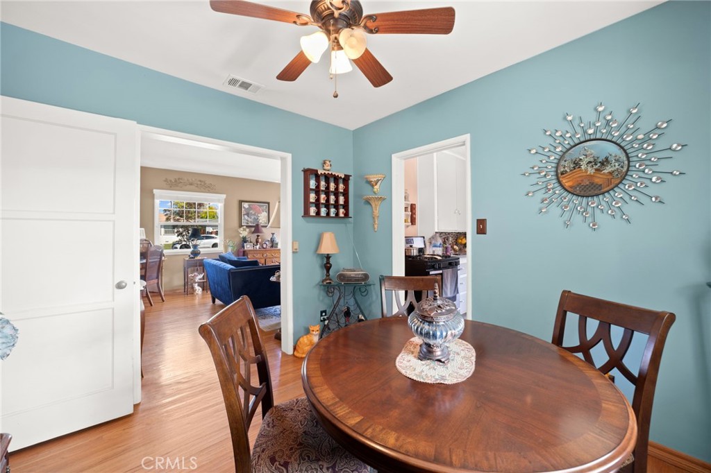 3924 Wayne Court Riverside, CA 92504 - Photo 15 of 31 a view of a dining room with furniture and wooden floor