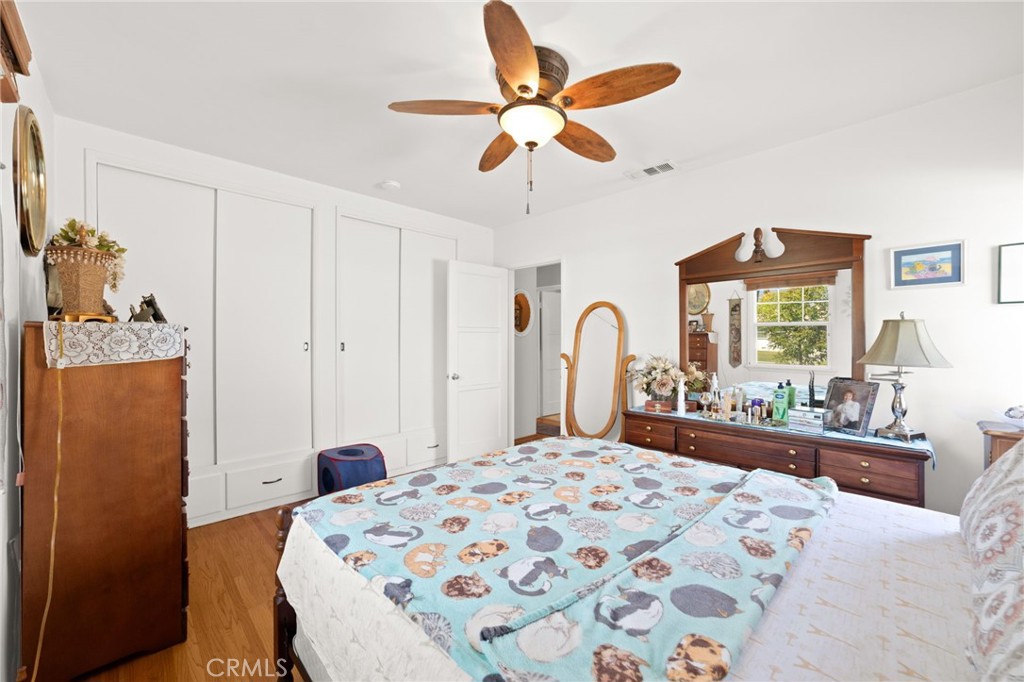 3924 Wayne Court Riverside, CA 92504 - Photo 21 of 31 a bedroom with a bed and a large window