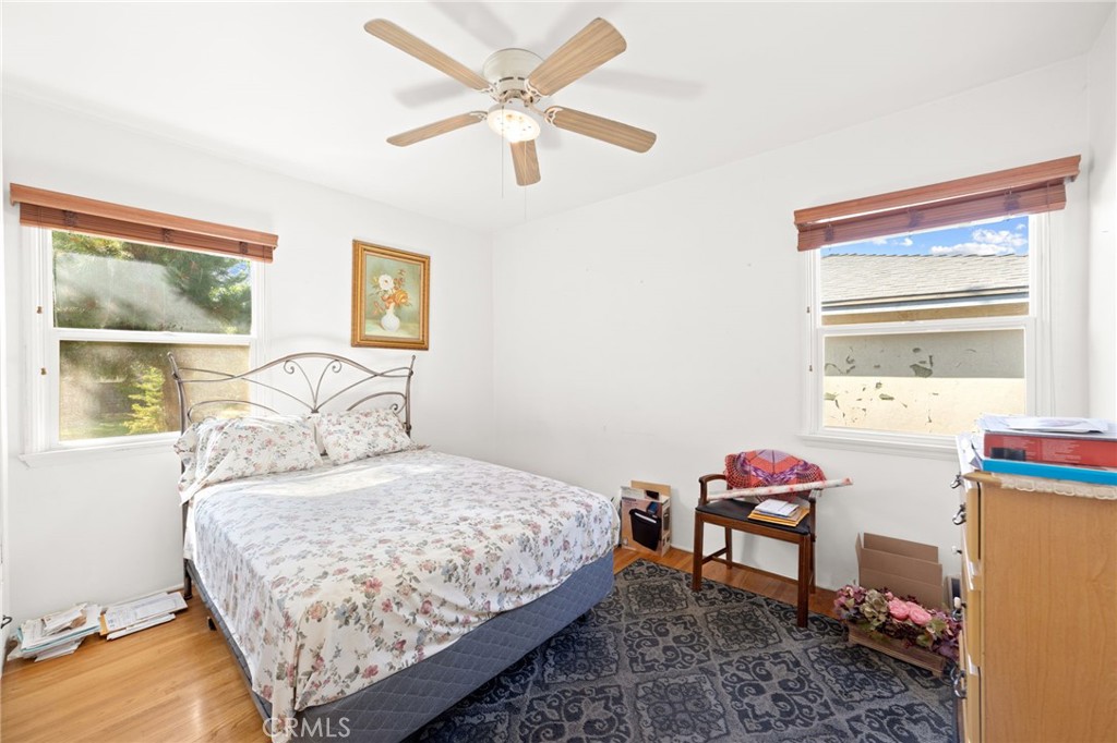 3924 Wayne Court Riverside, CA 92504 - Photo 22 of 31 a bedroom with a bed and a window