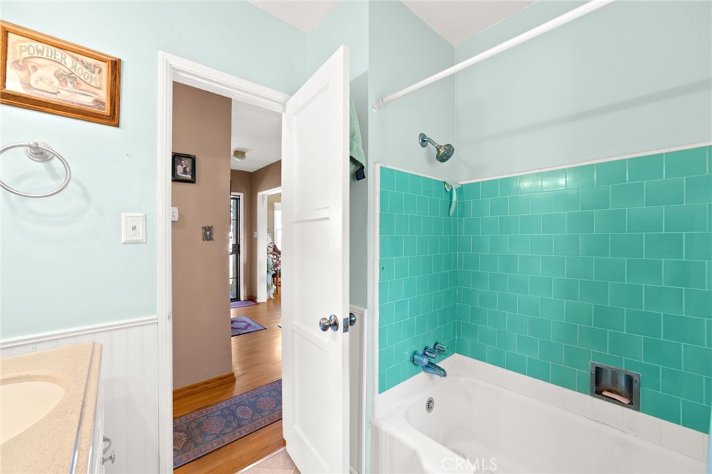 3924 Wayne Court Riverside, CA 92504 - Photo 25 of 31 a bathroom with a bathtub and a shower