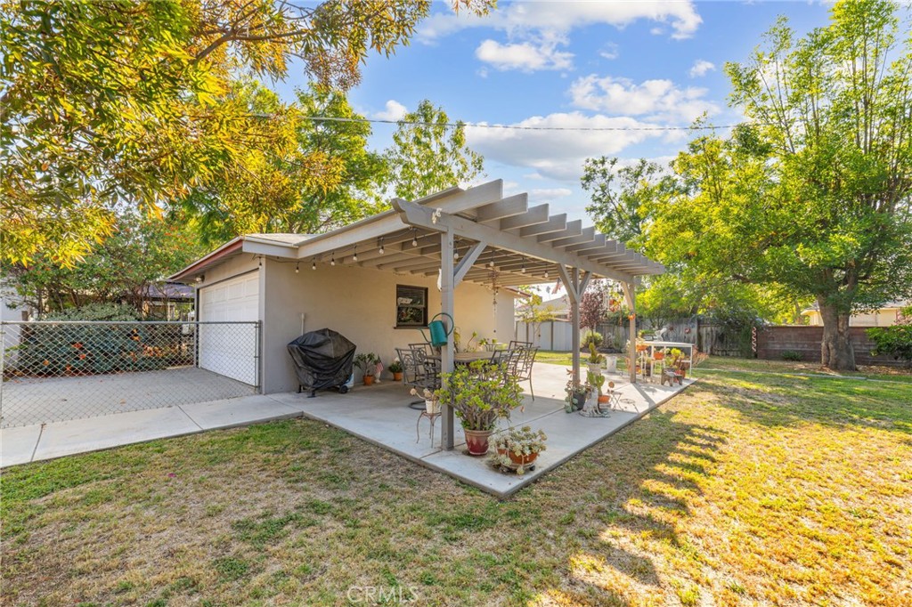 3924 Wayne Court Riverside, CA 92504 - Photo 29 of 31 a view of a house with a yard patio and swimming pool