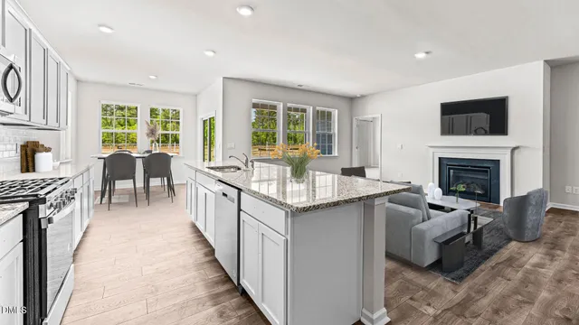 a view of an empty room and entryway