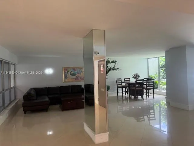 a view of a livingroom with furniture and a couch