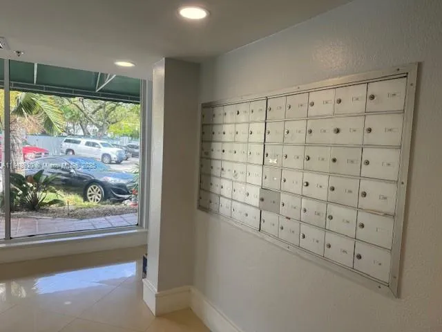 a view of walk in closet with window