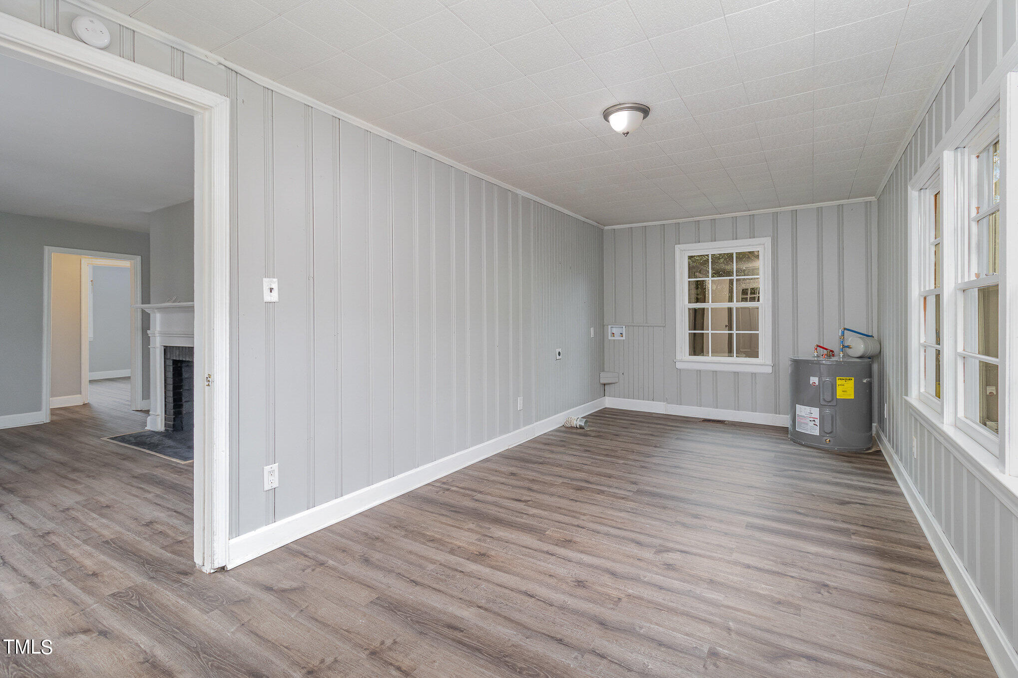 2813 Fowler Avenue Raleigh, NC 27607 - Photo 13 of 30 wooden floor in an empty room with a window