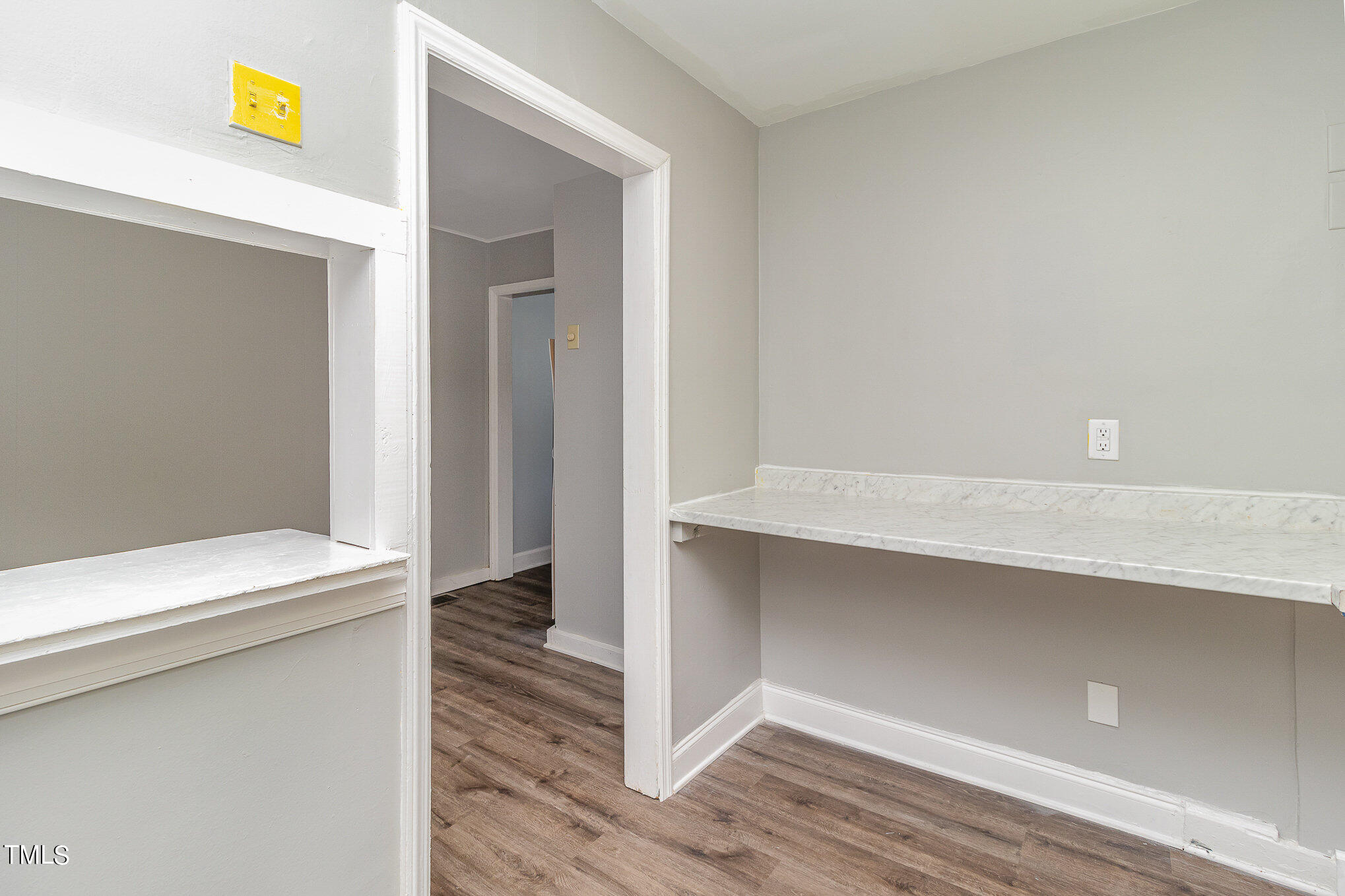 2813 Fowler Avenue Raleigh, NC 27607 - Photo 17 of 30 a hallway with cabinet