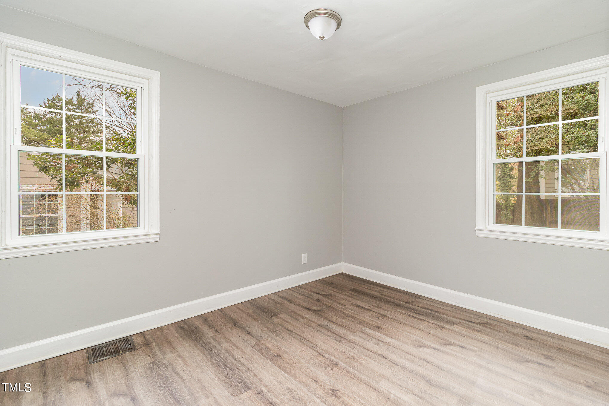 2813 Fowler Avenue Raleigh, NC 27607 - Photo 20 of 30 an empty room with a window
