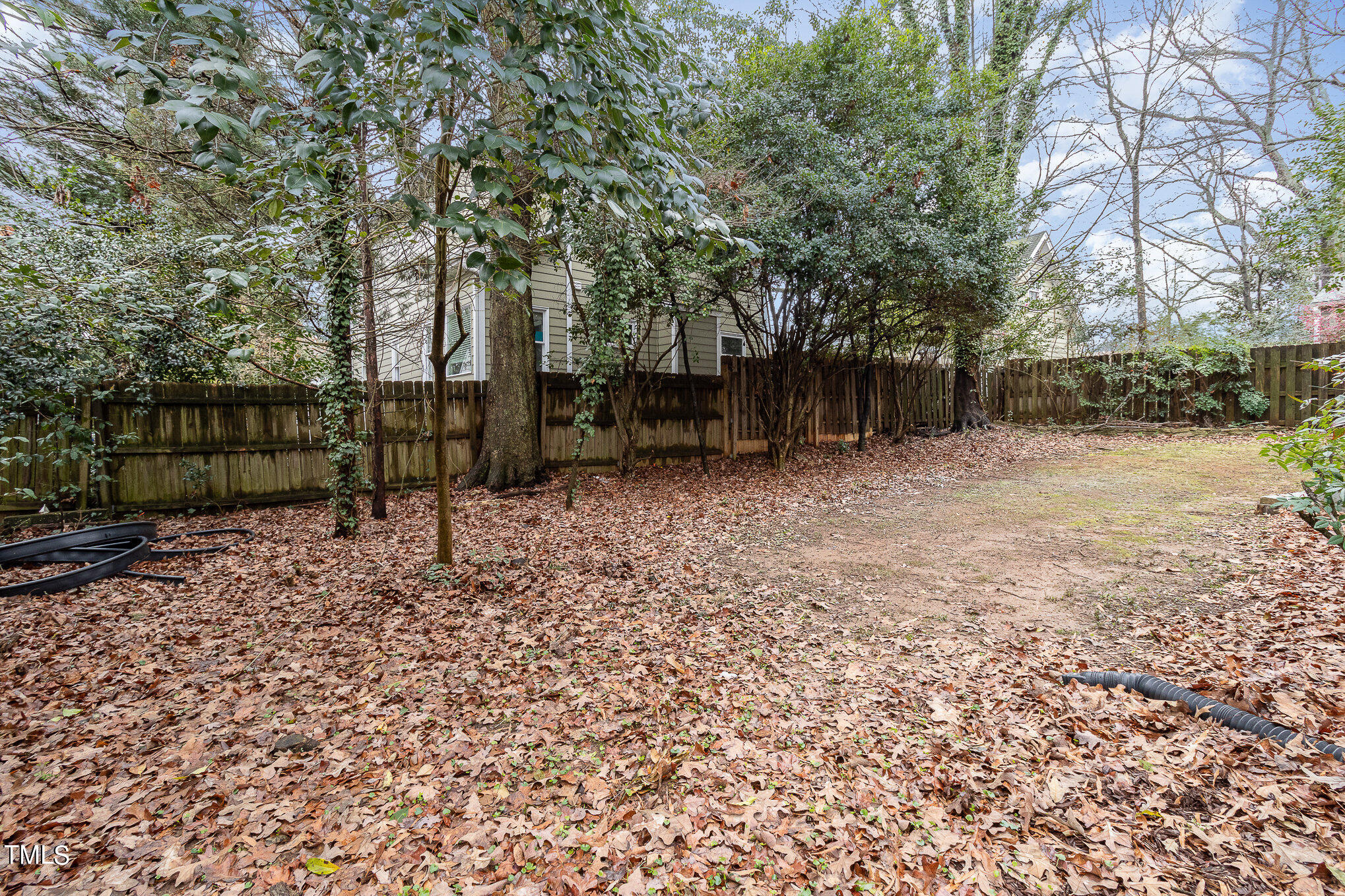 2813 Fowler Avenue Raleigh, NC 27607 - Photo 29 of 30 a backyard of a house with lots of green space